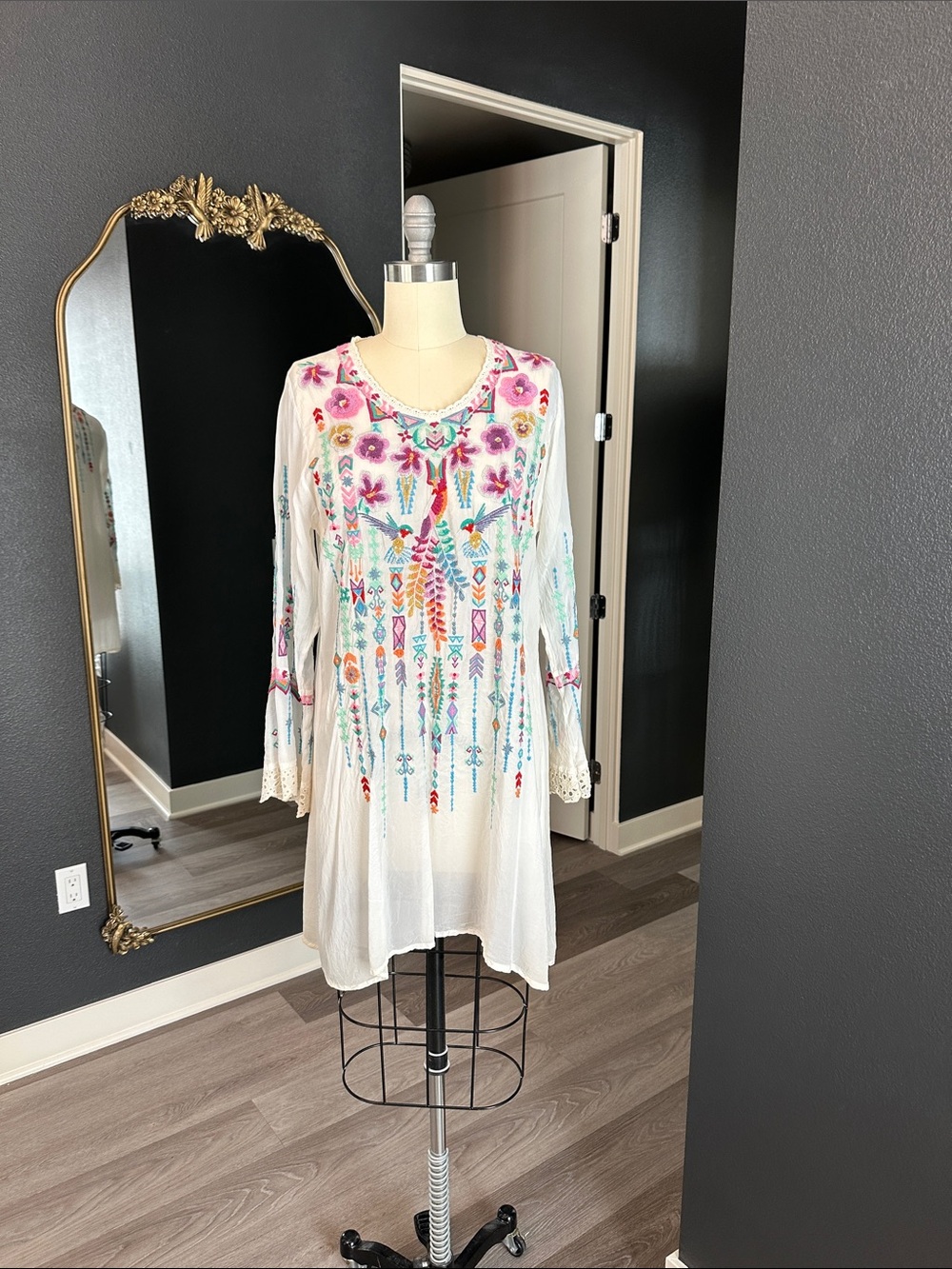 Johnny was  Embroidered White Boho Tunic Dress with Bright Floral Motif